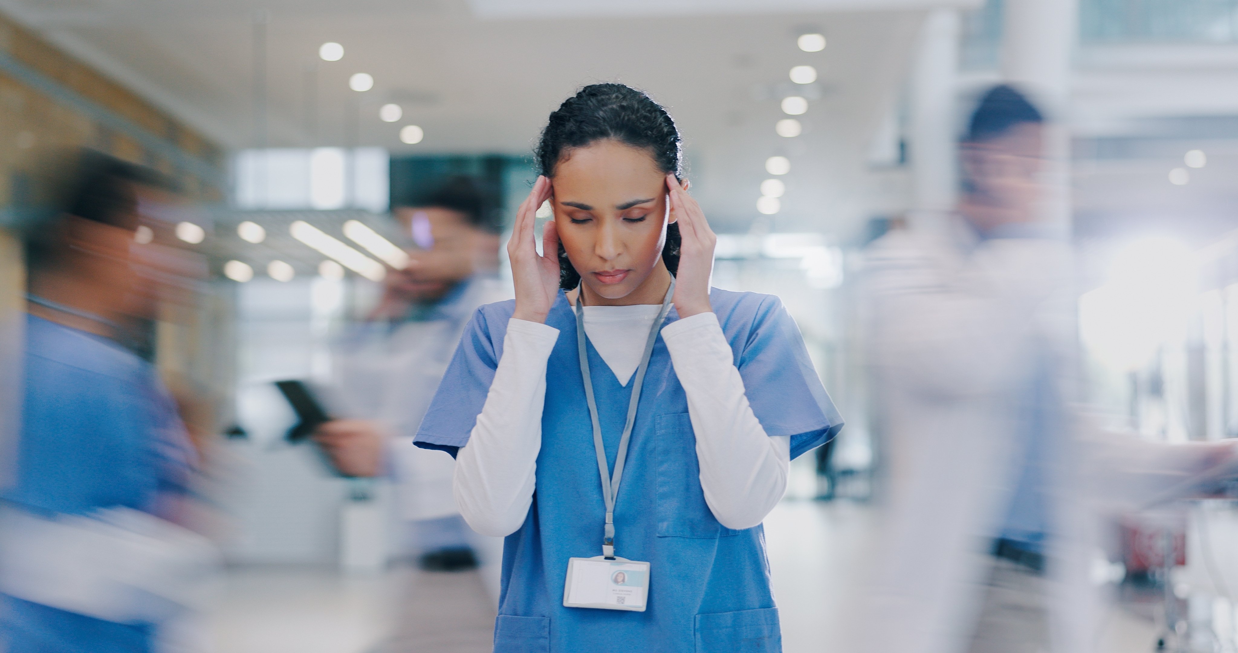 Medical professional in a fast-paced healthcare setting highlighting the importance of emergency preparedness planning.