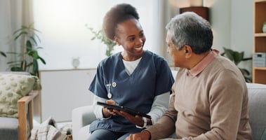 african american physician smiling at patient