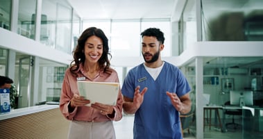male nurse with a bread and female insurance agent holding a folder